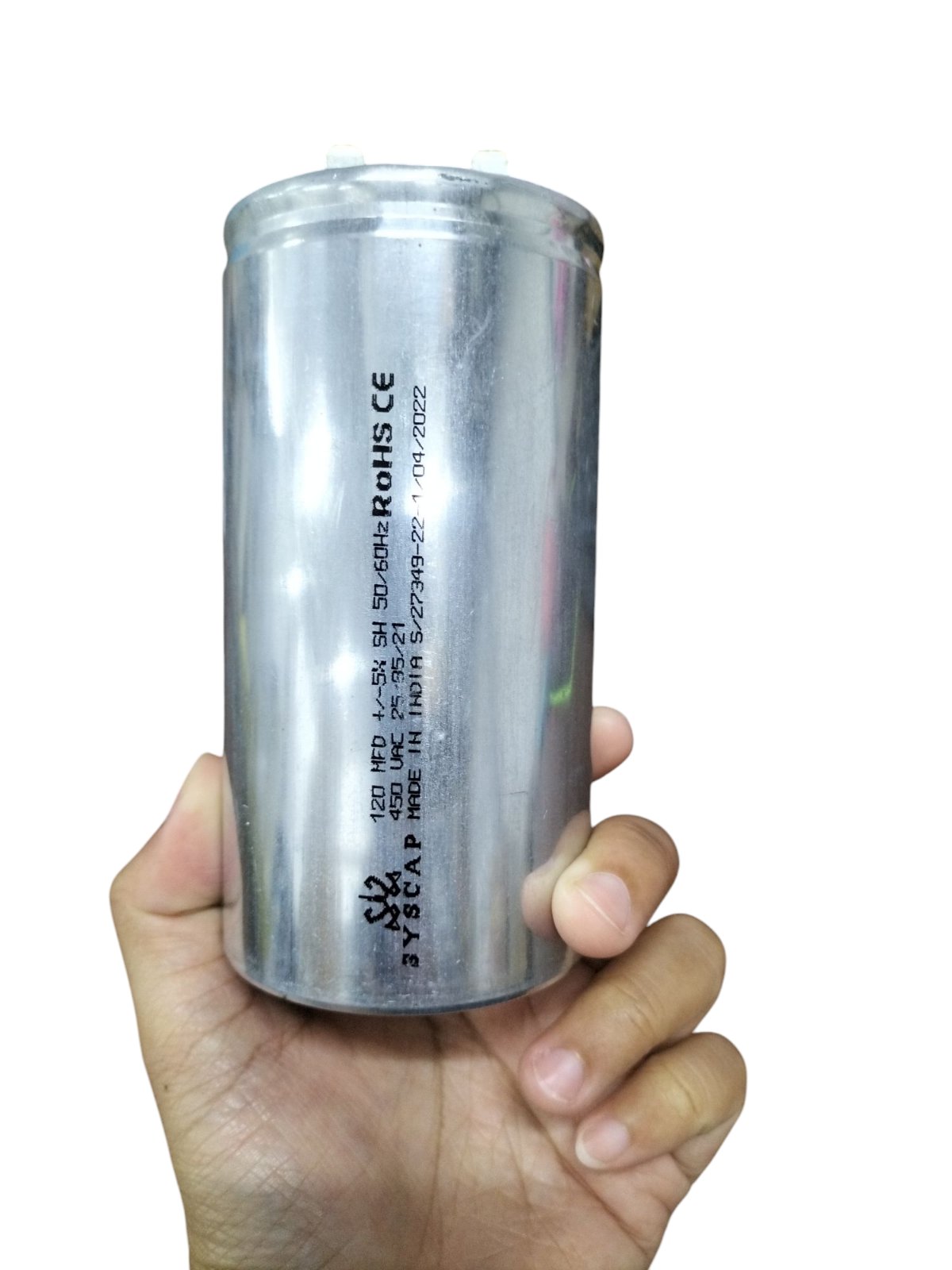 Syscap 120 MFD 450V AC running capacitor Oil Filled held in hand, ideal for electrical applications