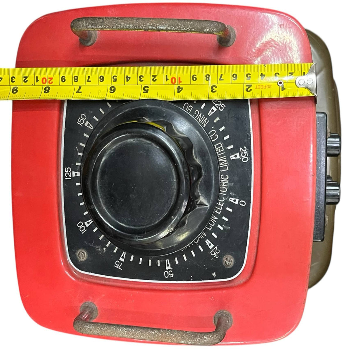 Stavol 5000W variac transformer with red housing and black control knob measuring over 9 inches wide