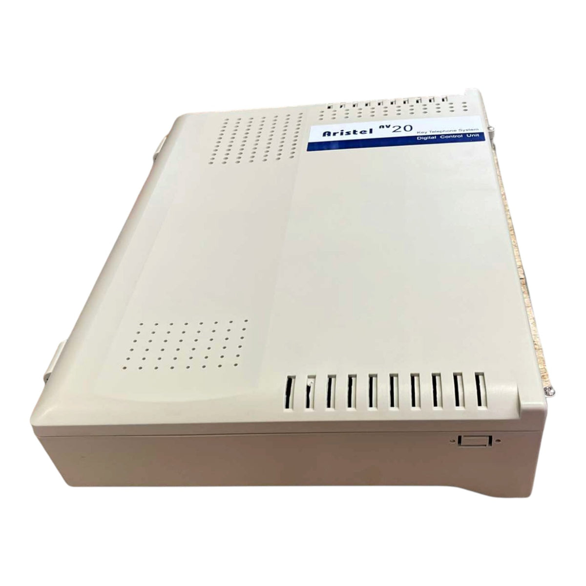 A beige Atrixel 20 digital air conditioner outdoor control box, photographed at an angle against a white background.