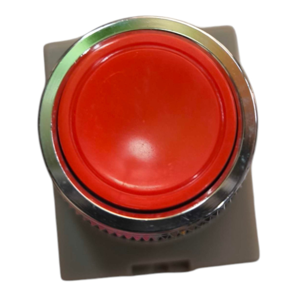 A red industrial push-button with a silver metal bezel and a gray mounting base, shown against a plain white background.