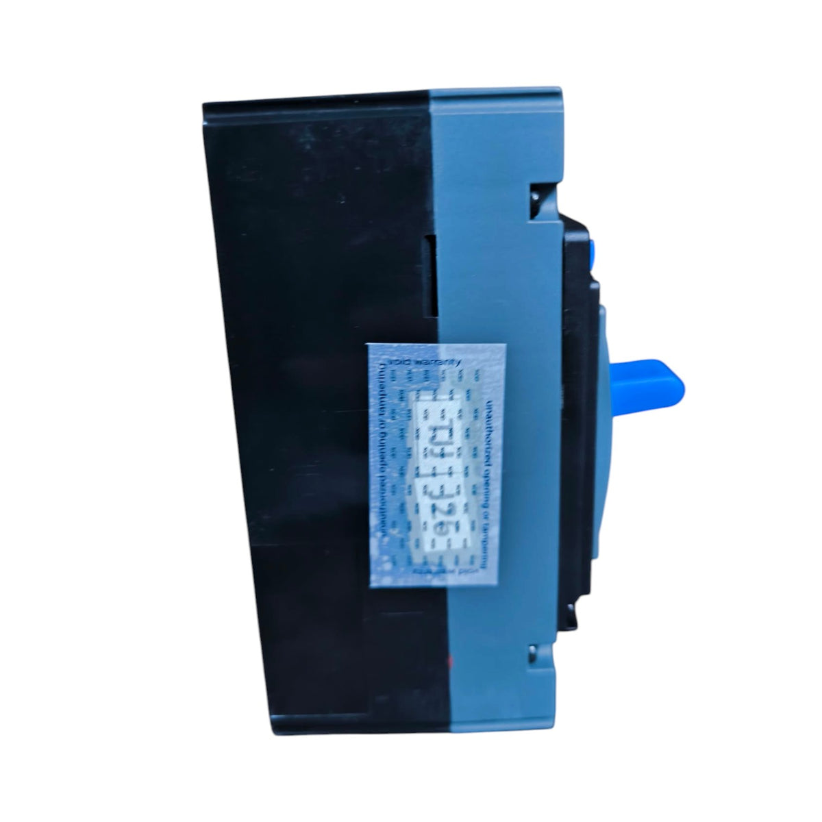 A black and blue electrical component, likely a circuit breaker or terminal block, with a blue handle visible on the right side and a white sticker on the front.