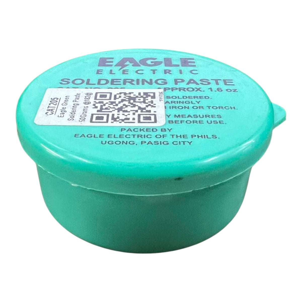A small round container of Eagle Electric Soldering Paste in a mint green color, with the brand name and product details printed on the lid.