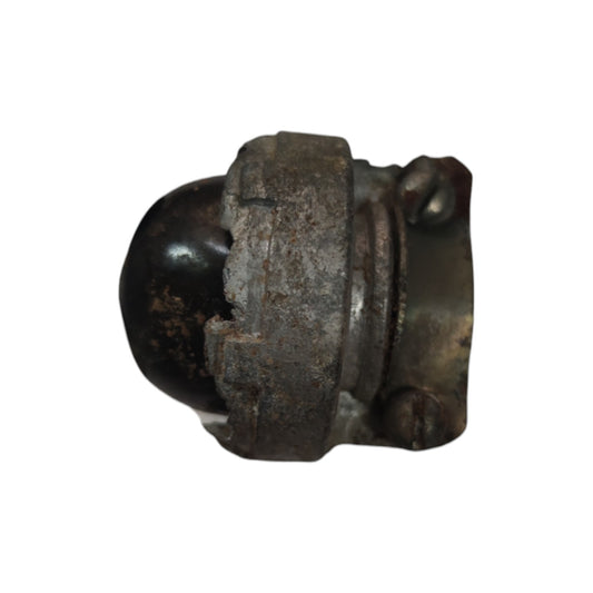 Rust-covered metal fitting on a white background