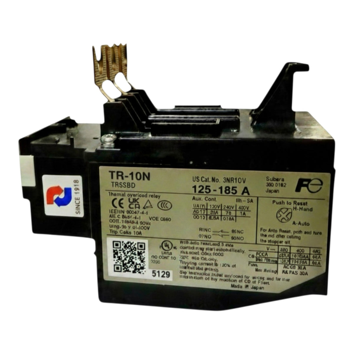 A black industrial TR-10N (TRSSBD) thermal overload relay with a white technical specification label, featuring gold-colored metal terminals on top, photographed against a white background.