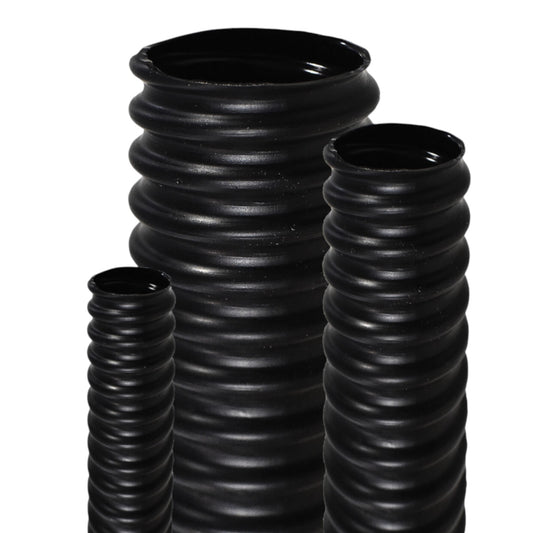 Three black ribbed flexible plastic tubes of different heights, arranged on a plain white background.