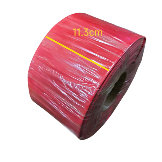 Roll of red material with a yellow line and measurement '11.3cm' on a white background