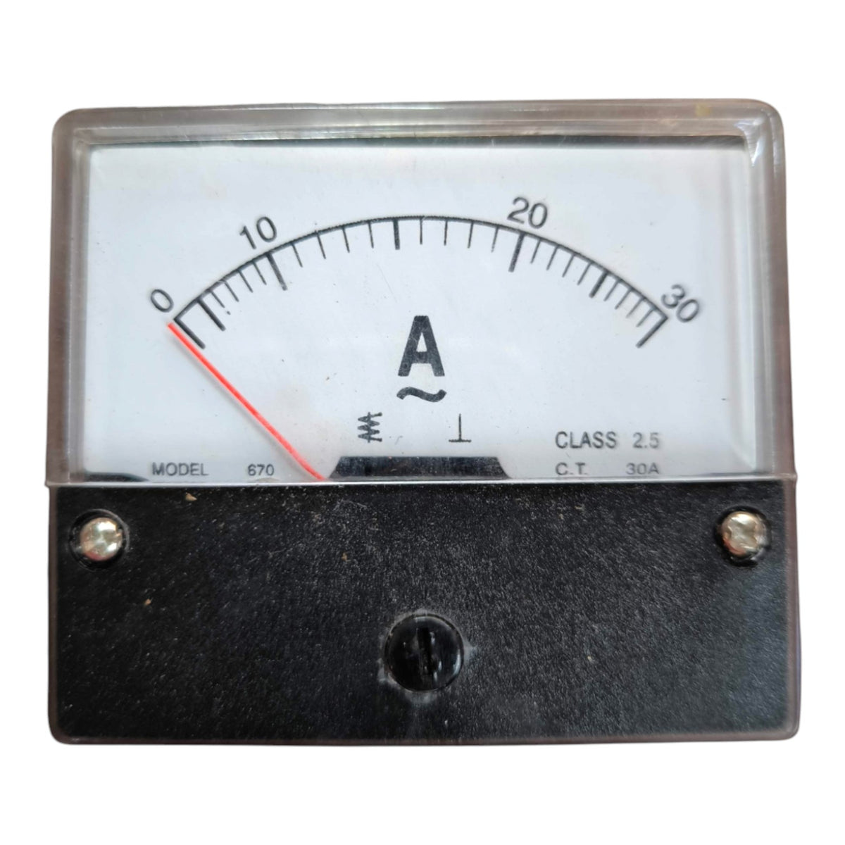 An analog ammeter gauge with a black metal housing, clear protective cover, white dial face, black scale markings, and a red needle.