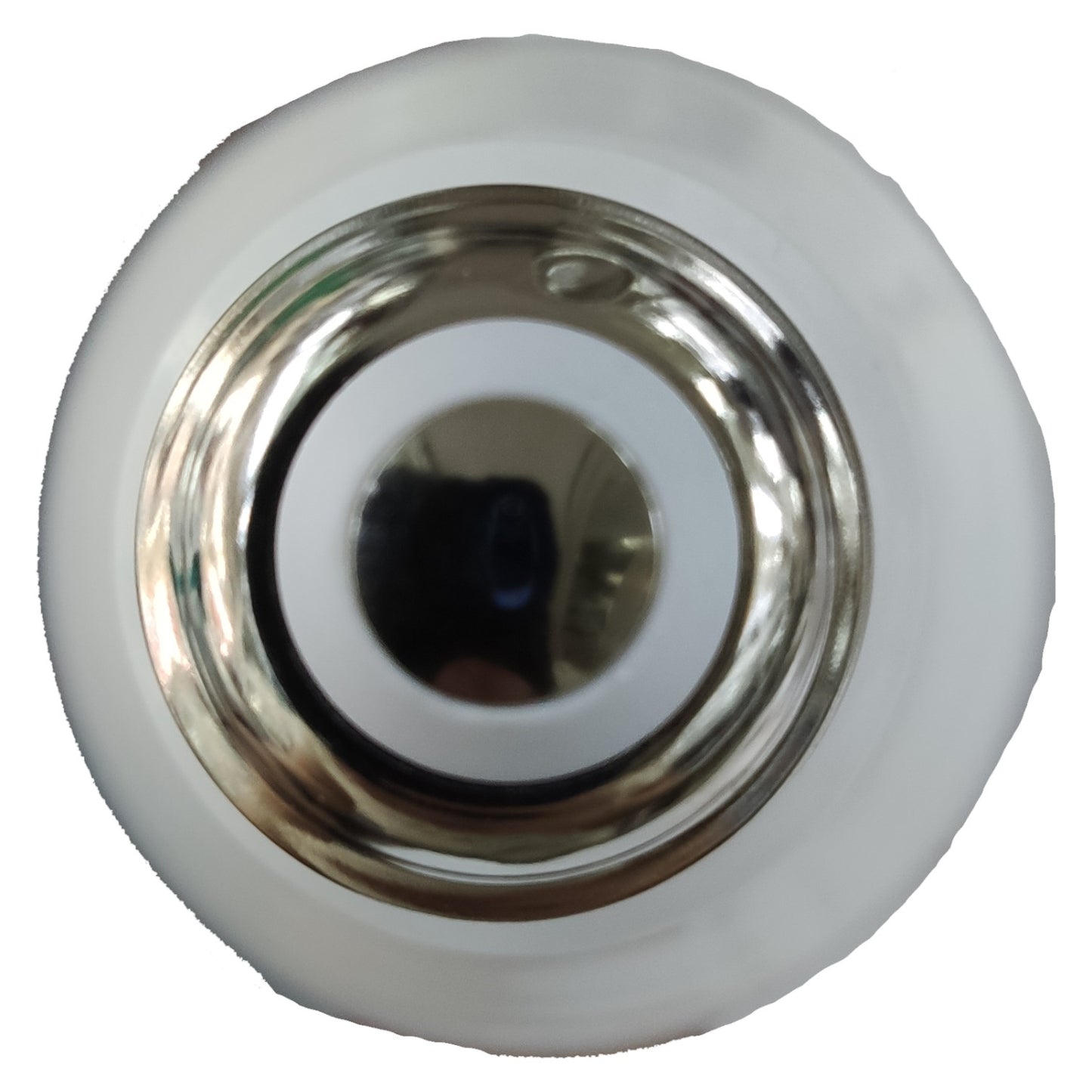 Round white object with metallic center on a white background