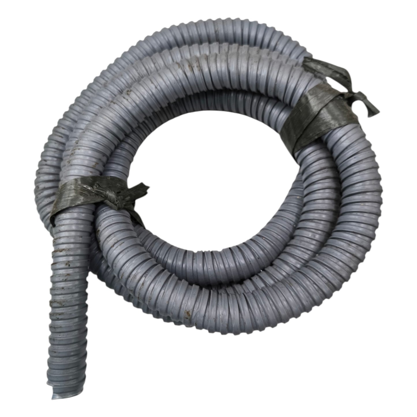 Coiled gray hose with metal clamps on a white background