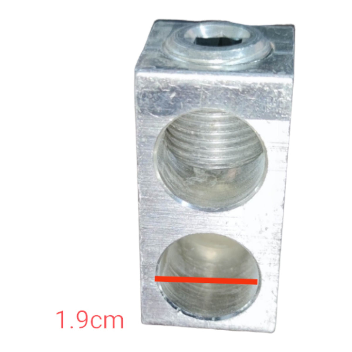 Metal block with three cylindrical holes on a white background