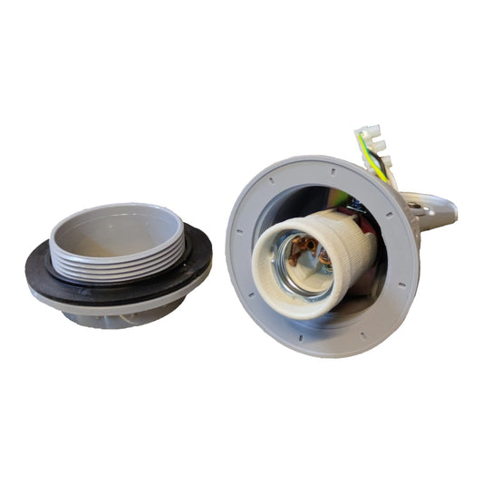 A disassembled recessed light fixture shown on a plain white background, with the outer housing and inner socket separated to reveal the bulb socket, wiring, and mounting components.