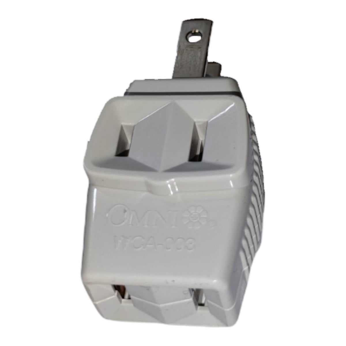 A white plastic OMNI international travel adapter plug with a metal grounding pin, shown on a plain white background.