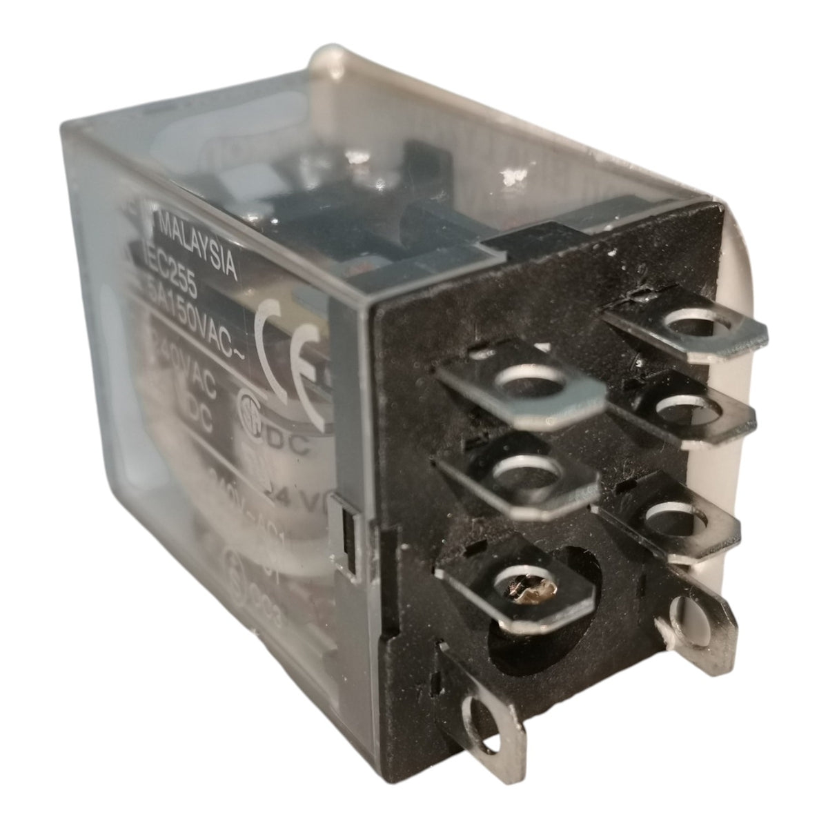 A small electrical relay component with a clear plastic housing, black internal mechanism, and metal terminal posts on the front, photographed on a plain white background.
