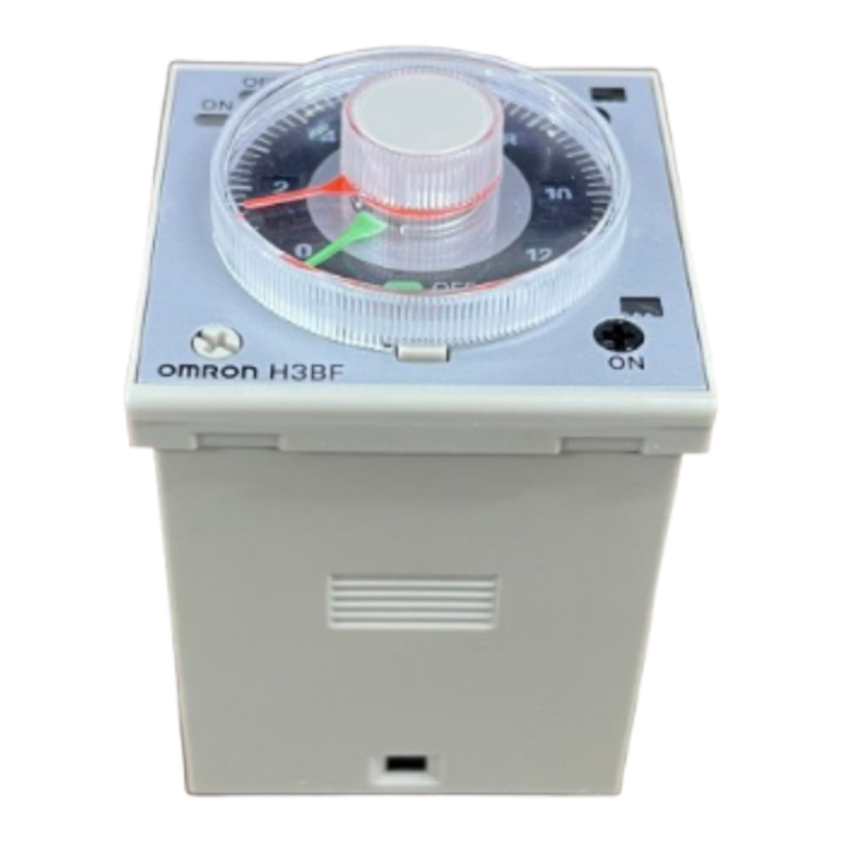 An Omron H3BF analog timer relay with a gray plastic body, a silver top faceplate, and a clear circular dial cover showing a red and green pointer against a white background.