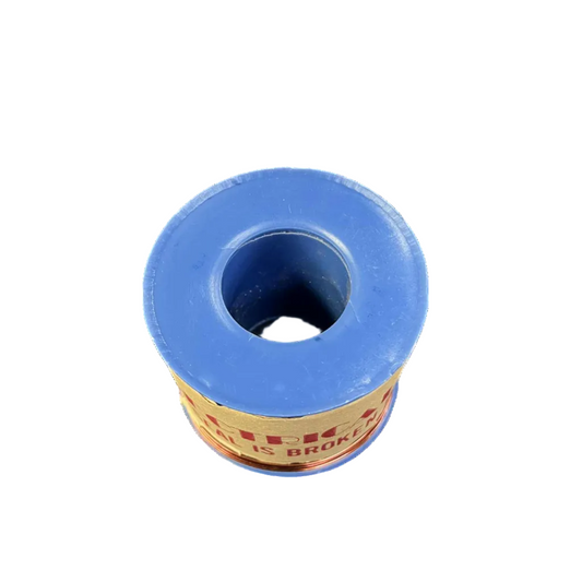 Blue spool of thread with a white background