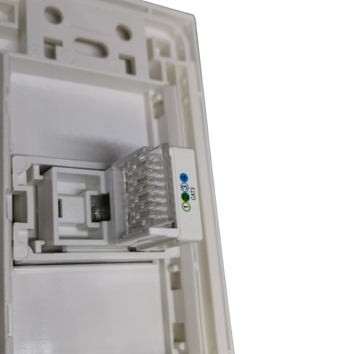 Close-up of a white RJ45 network module with an integrated status LED indicator showing blue, green, and white lights.