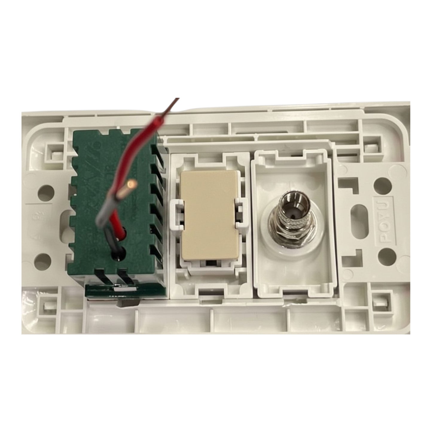 Close-up of a white plastic electrical switch or control module showing internal components, including a green circuit board, a beige relay, and a metal terminal, with red and black wires connected.