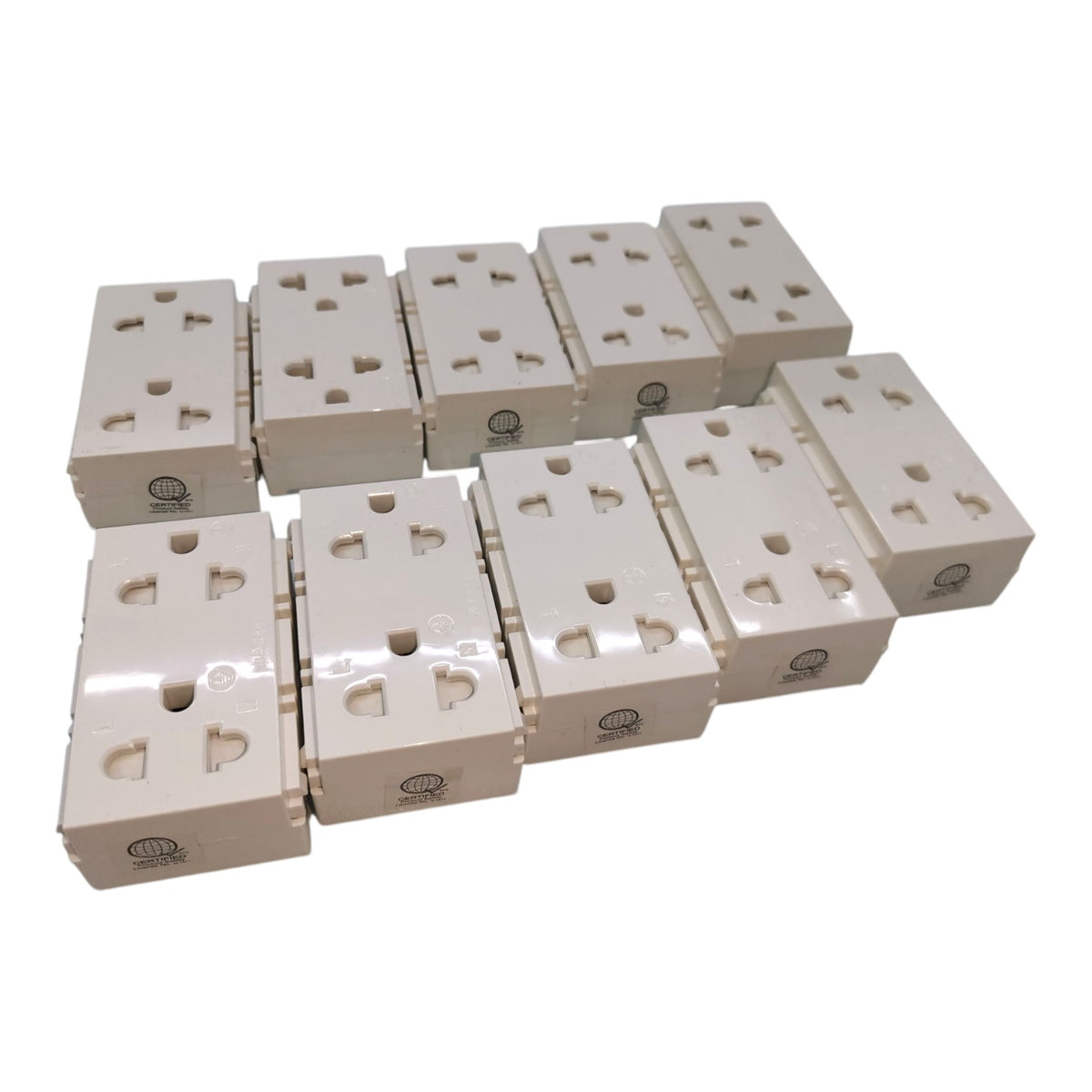 Ten cream-colored plastic wall outlets arranged in two rows on a plain white background.