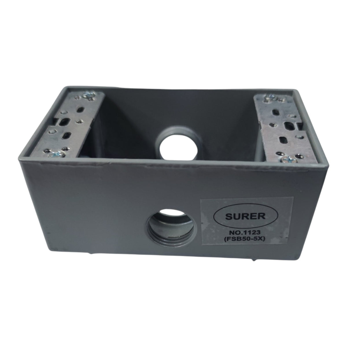 A dark gray plastic utility box with mounting holes on the top and a threaded connection on the front, featuring a label that reads 'SURER'.