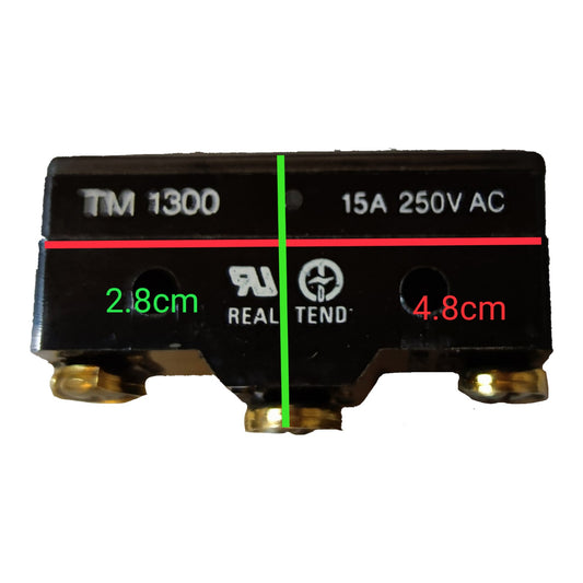 A black electrical terminal block with brass screw terminals, printed text including TM 1300, 15A 250V AC, and size measurements in green and red, on a white background.