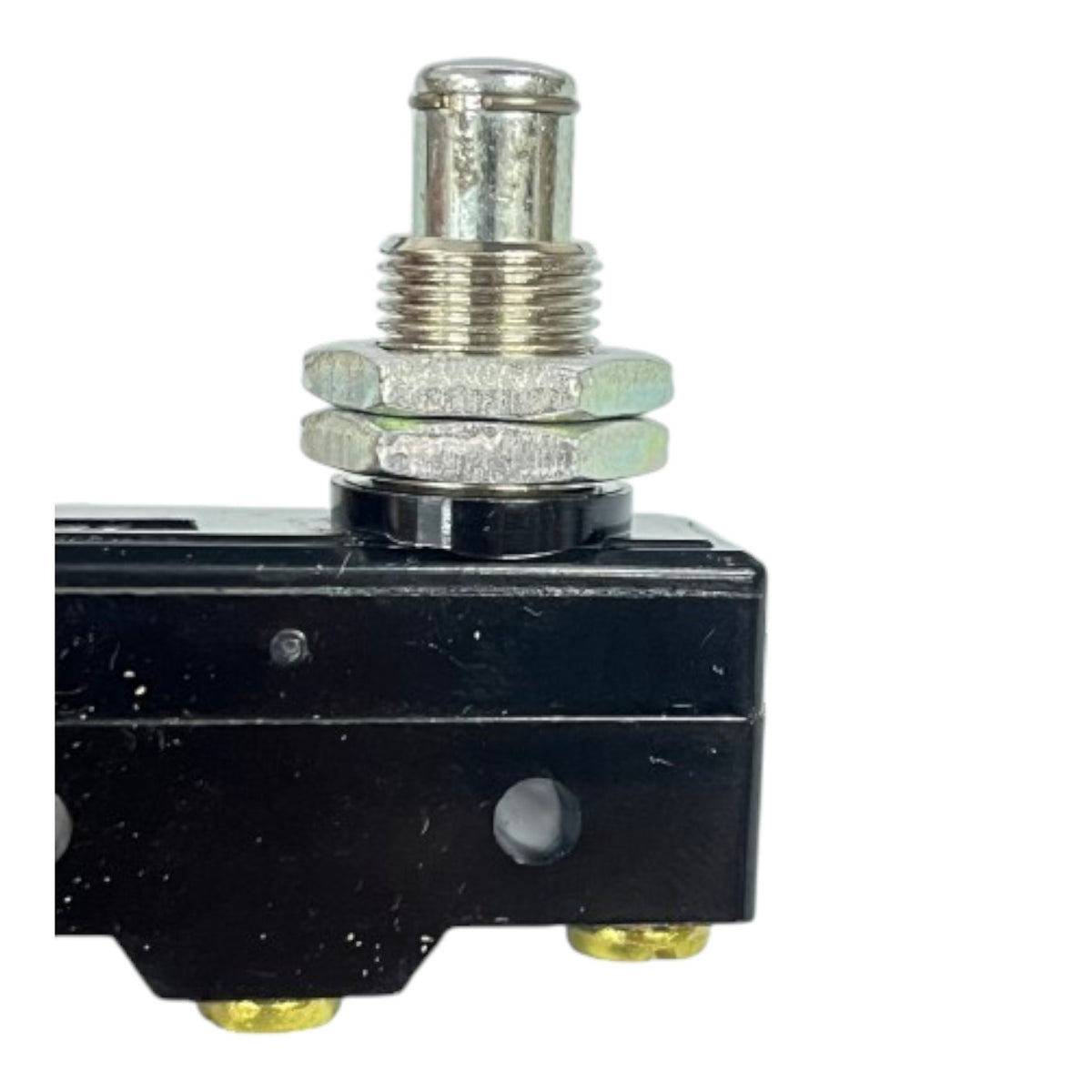 A close-up of a black metal mechanical component with a silver threaded rod, hex nut, and small brass-colored feet, shown on a plain white background.