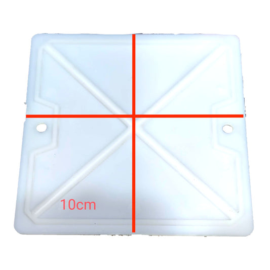A square white plastic panel with a raised cross-shaped ridge pattern and two small circular holes near the corners, shown on a white background with red measurement lines and the text '10cm' indicating dimensions.
