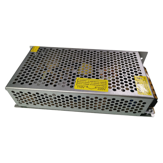 Rectangular metal power supply unit with perforated design on a white background