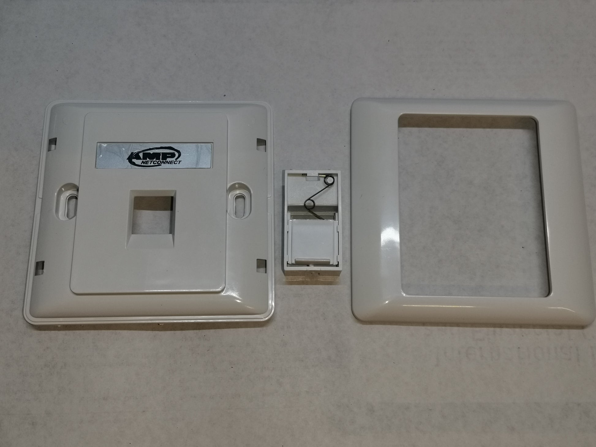 AMP 1 gang faceplate in white with mounting frame and switch component for power points and switches