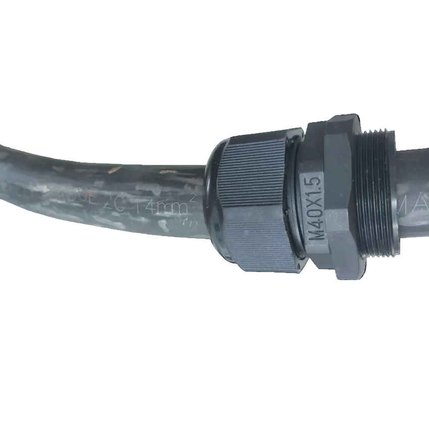 Grippes black Cable Gland M40 22-28mm attached to a transparent cable on black background