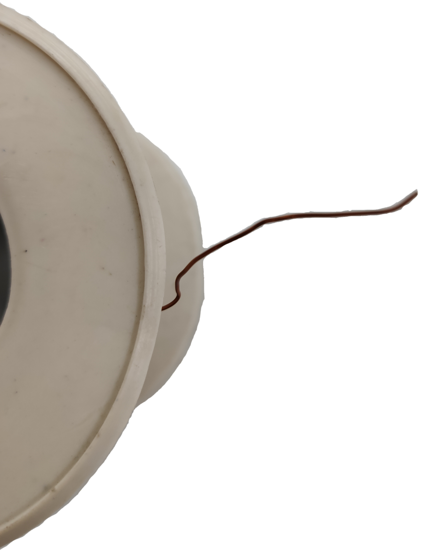 Philflex spool of thin brown magnet wire on white reel against black background Magnet Wire AWG 43 - 200g