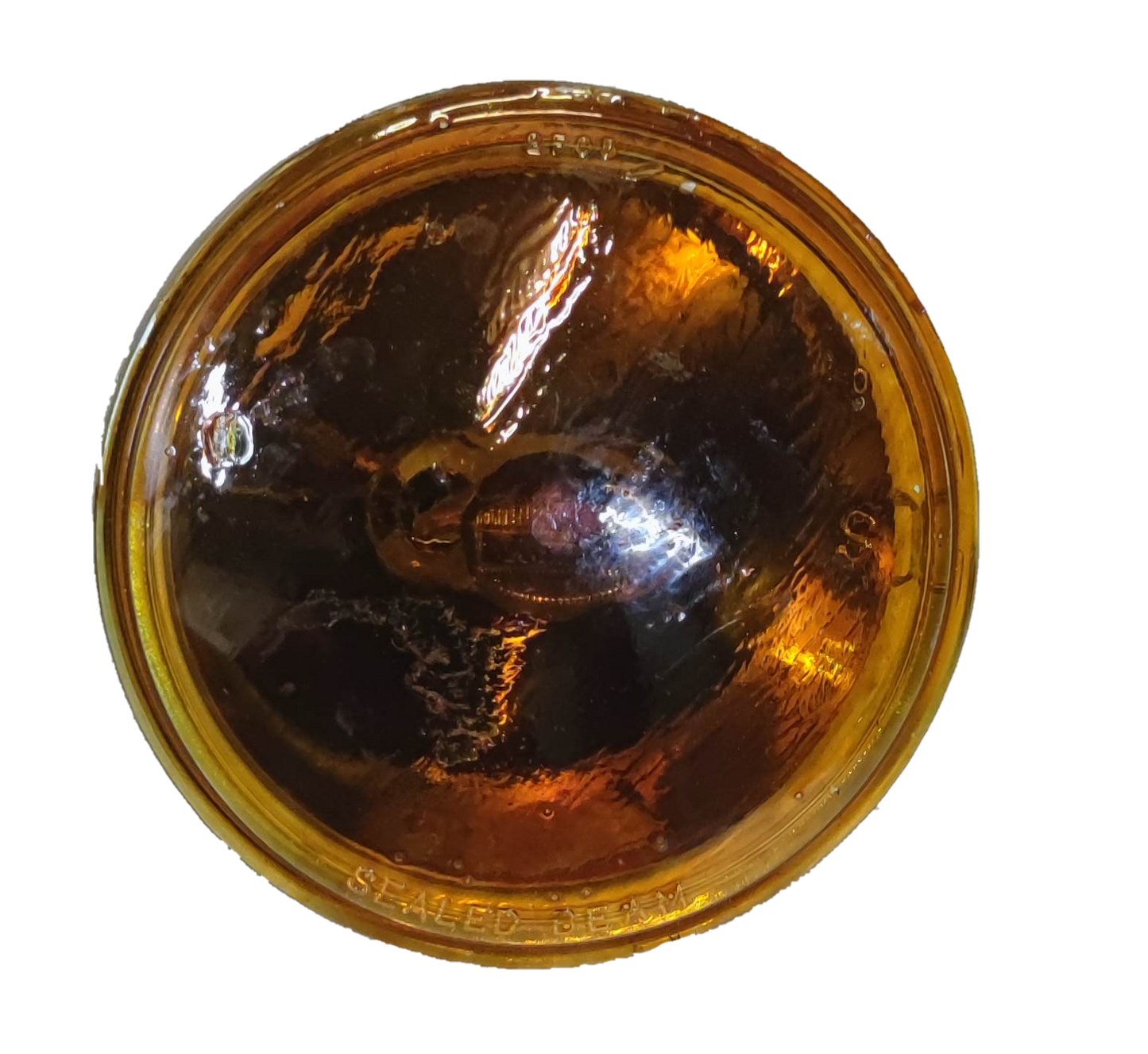 GE sealed beam 12V 30W spotlight with a round amber lens for optimal brightness