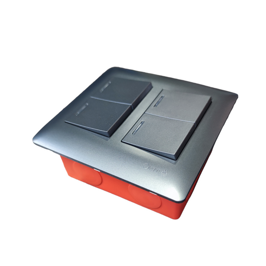 Omni 4 gang illuminated wall switch with a sleek metallic faceplate and four black rocker switches
