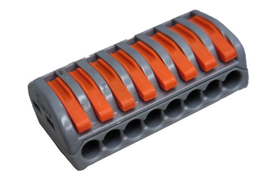 8 way wire connector with orange levers and gray base for electrical circuitry parts