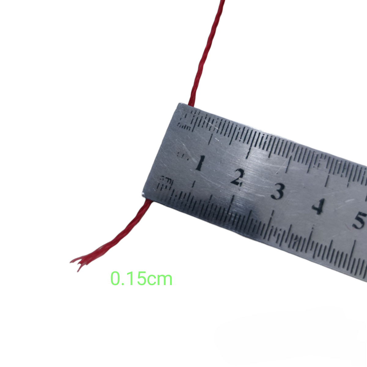 Close-up of industrial nylon rope spool red with a measuring ruler showing 0.15cm thickness