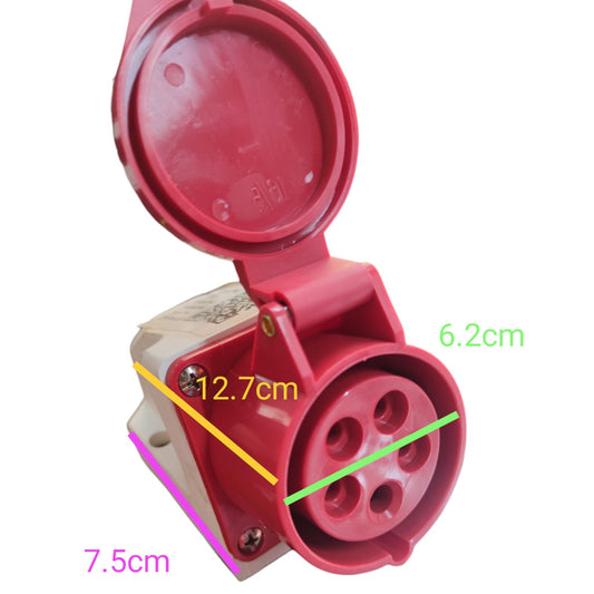 A red electrical outlet connector with a hinged cover open, shown on a white background with overlaid dimension labels in centimeters: 12.7cm, 6.