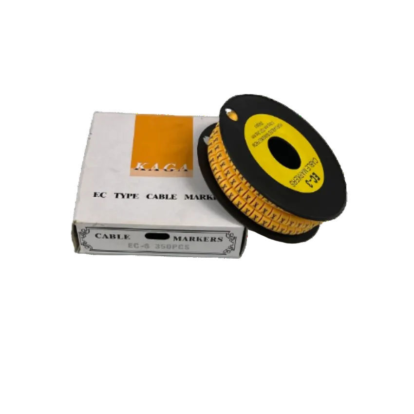 Grippes Cable Marker X - Yellow spool of numbered adhesive cable markers on black reel beside white box