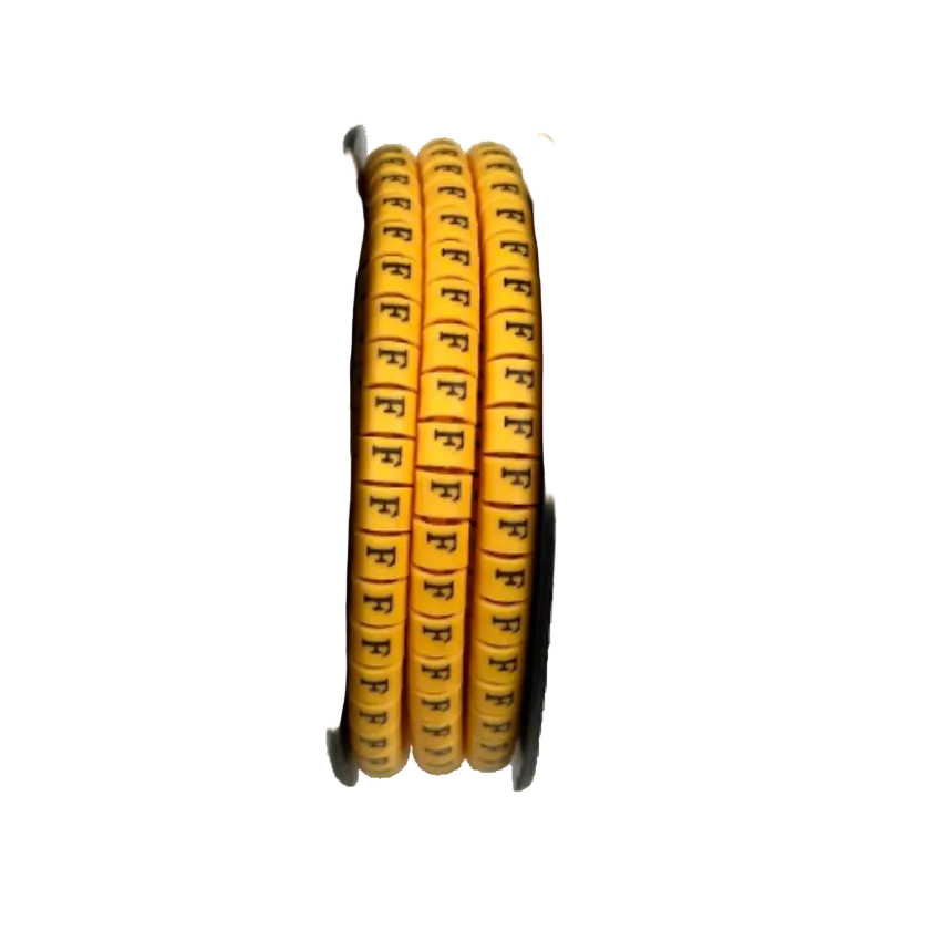 Grippes spools of Cable Marker Yellow - F cable labels on three yellow marker reels for wire identification