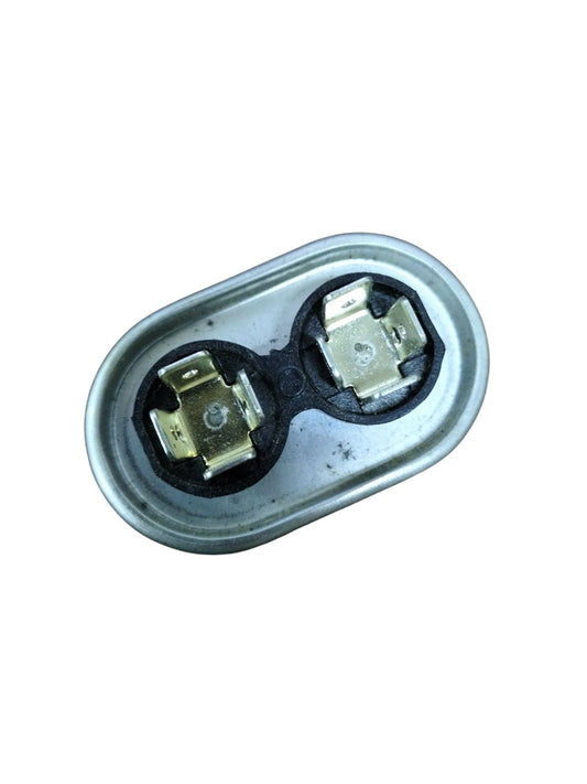 Mallory 440V running capacitor with dual terminals in a compact oval design for electrical applications