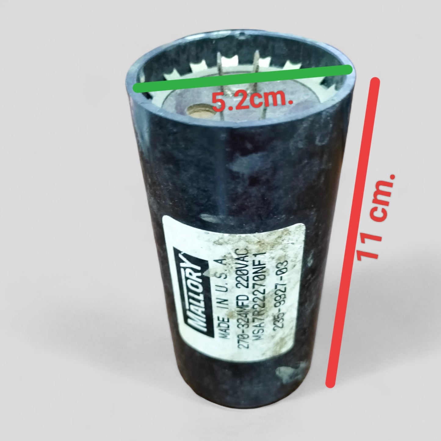 BMI Motor Starting Capacitor 270-324 UF cylindrical black electrical component with labeled specifications