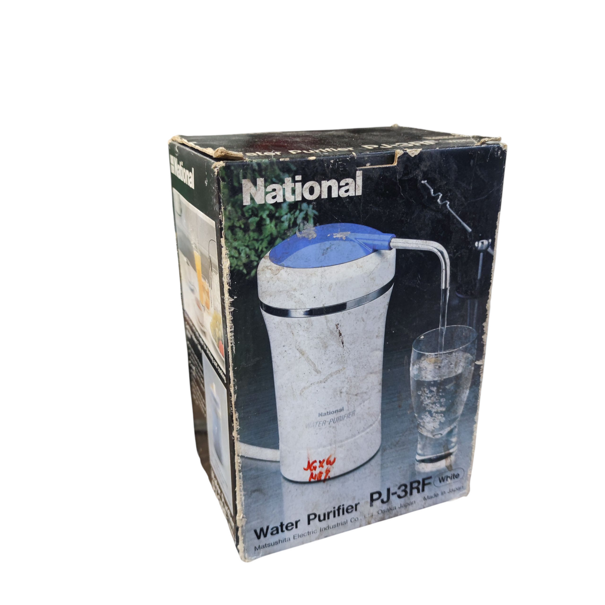National Water Purifier PJ-3RF unit with blue lid and dispensing spout next to a glass of water on original packaging box