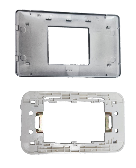 Omni Center Device Plate Graphite showing front and back plastic mounting frames for power points and switches