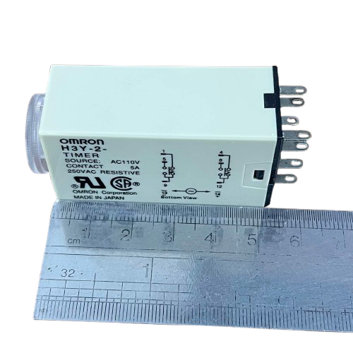 OMRON relay timer with front dial and visible pins on ruler Timer Relay 10 seconds 8 pins 110V
