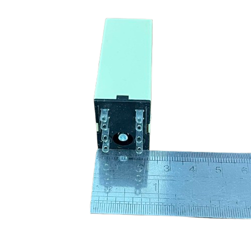 OMRON Timer Relay 30 seconds 8 pins 110V showing black pin base and ruler for size reference