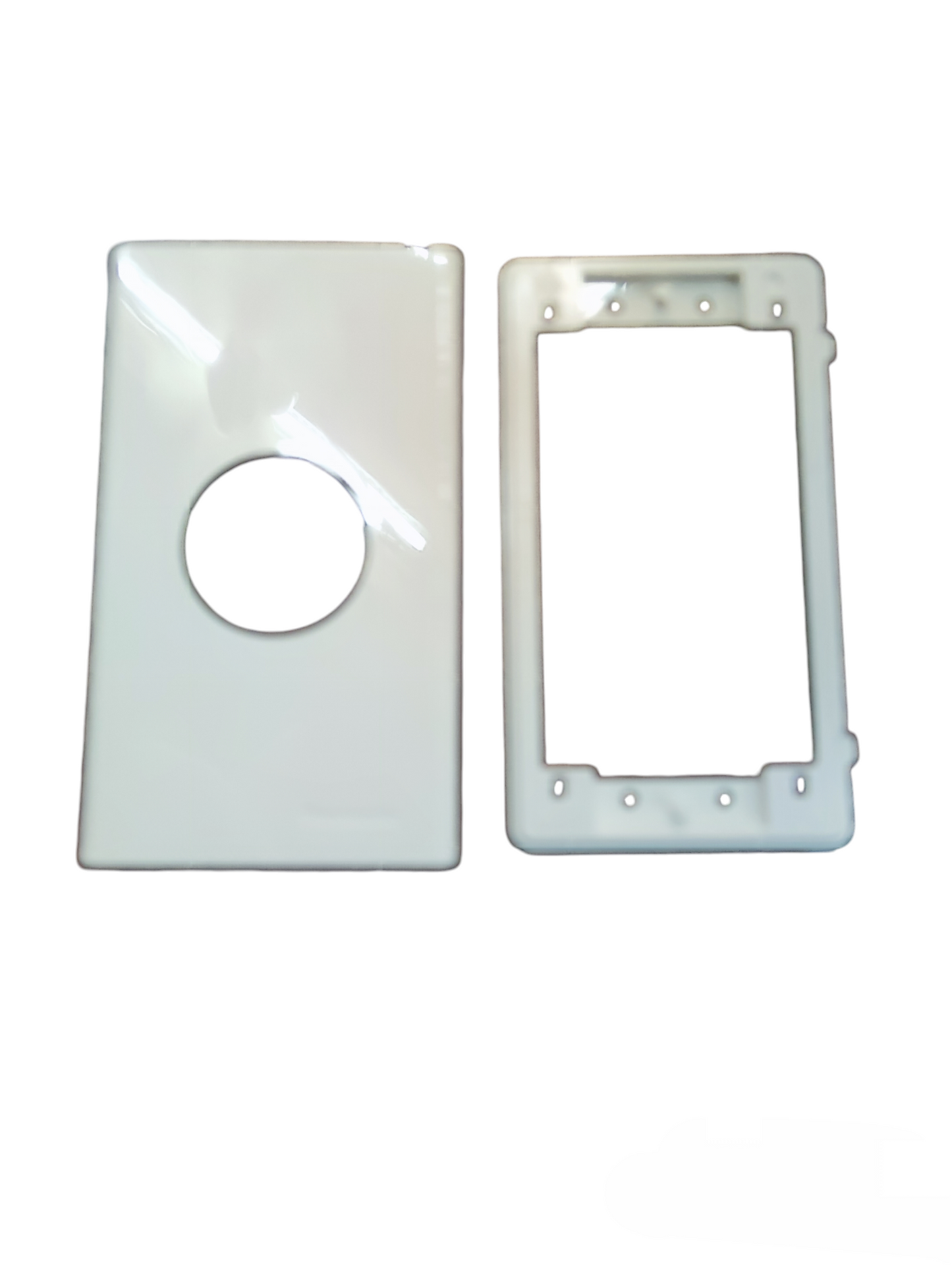 White Panasonic 1 gang plate cover with rectangular frame and circular opening for switches