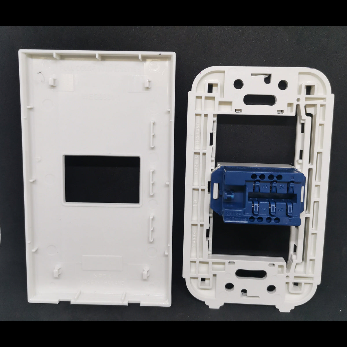 Panasonic Telephone Outlet Wide Series 1 Gang white faceplate with blue jack module for wall installation