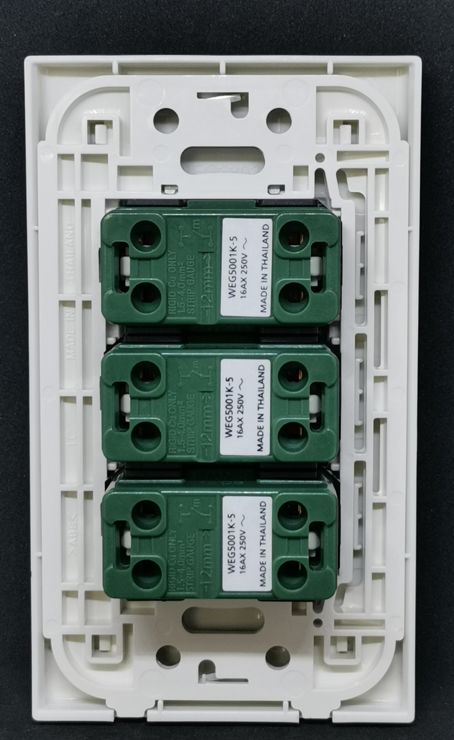 Panasonic Wall Switch 3 Devices WEG5001-K back view showing white frame and three green switch modules
