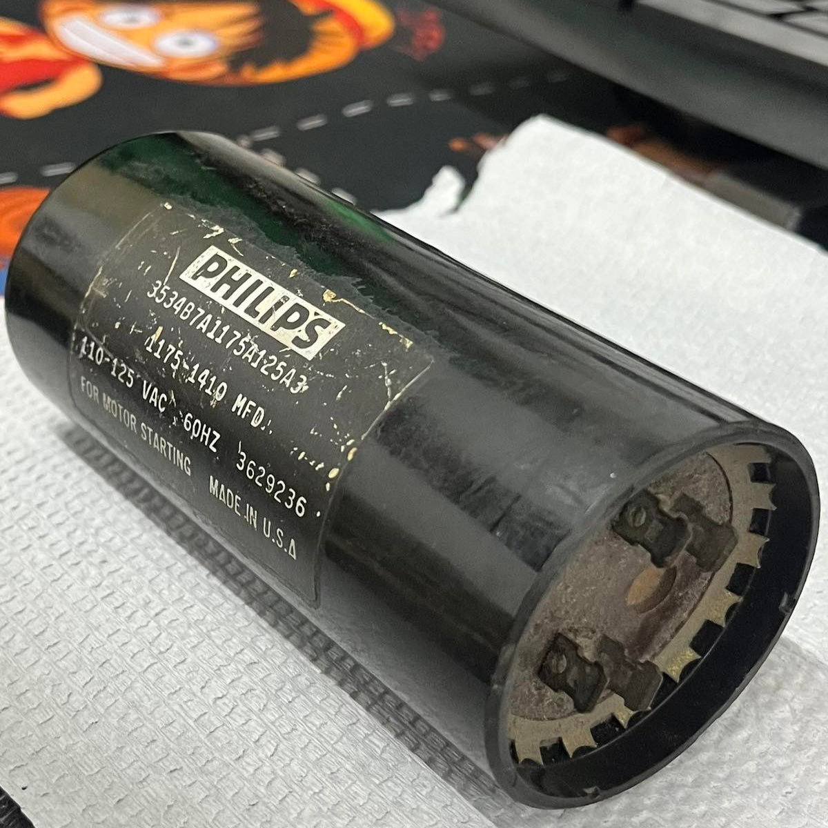 Philips electrical Starting Capacitor 1175-1410MFD black cylindrical component for circuit use