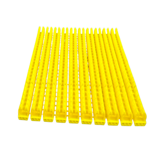 Grippes A-Z wire marker clips Yellow neatly lined on black background for cable management and cable labeling