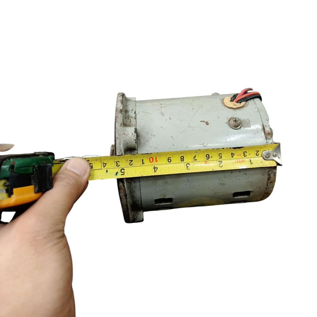 National electrical RMP REFURBISHED Motor being measured with a yellow tape measure for size