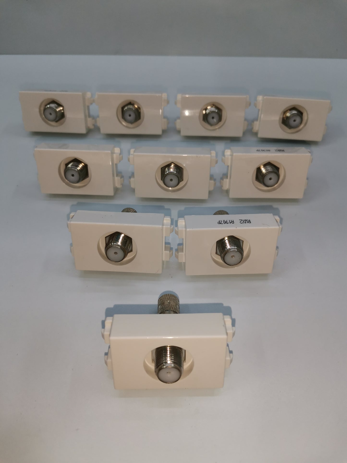Set of Royu cable TV outlet connectors in white for electrical circuitry and parts